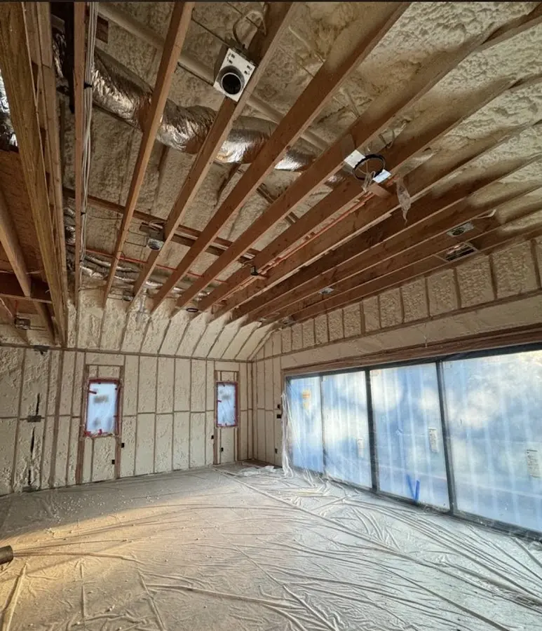 Interior walls and ceiling insulated with spray foam during new construction in Bucyrus